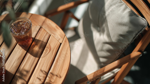 Cold Drink with Ice on Outdoor Terrace Table