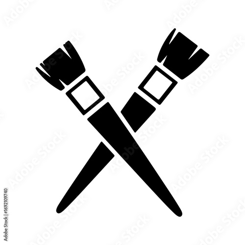 Two crossed paintbrushes with transparent background