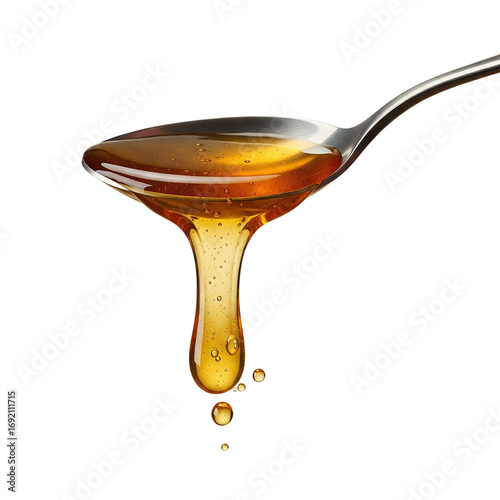 honey dripping from spoon