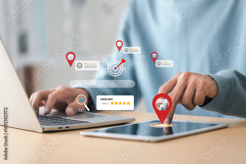 Bild auf Leinwand Local search marketing and SEO concept , Businessman using laptop and tablet sea