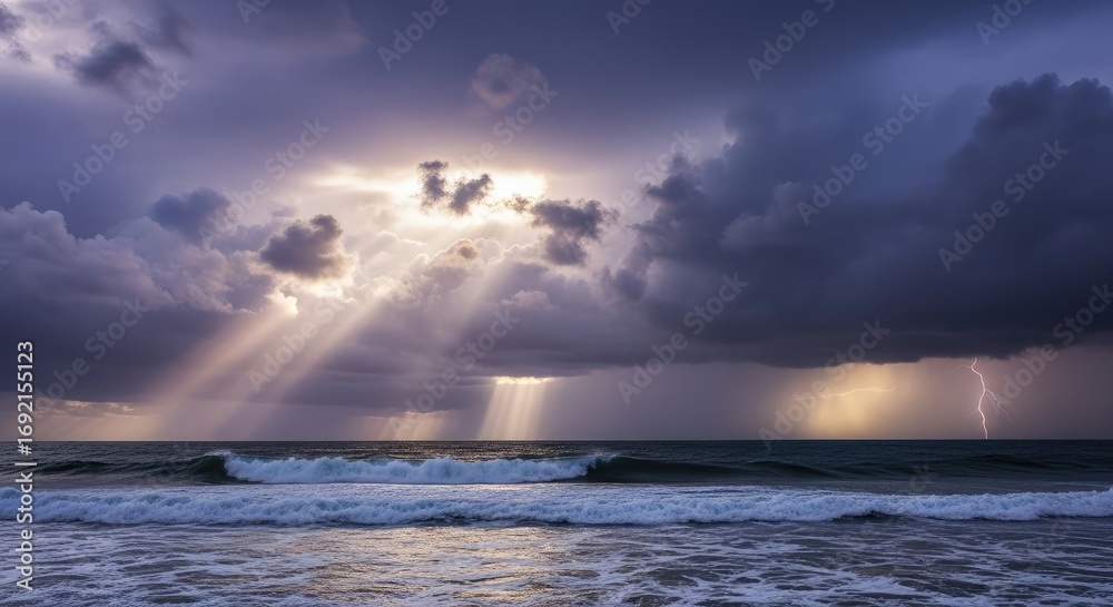 Fototapeta premium Dramatic Sun Rays Breaking Through Stormy Clouds Over the Ocean Waves