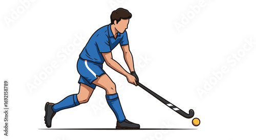 A hockey player wearing blue is running and swinging his stick to hit a yellow ball