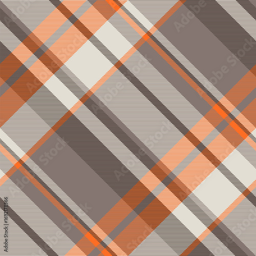 Elegant plaid pattern featuring warm autumnal colors. Ideal for backgrounds, textiles, or digital designs needing a classic yet modern feel. Versatile and appealing.