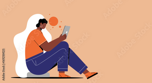 A diverse woman sits comfortably, engaging with a tablet, symbolizing online communication, digital learning, or casual browsing. Ideal for technology, lifestyle, and business content.