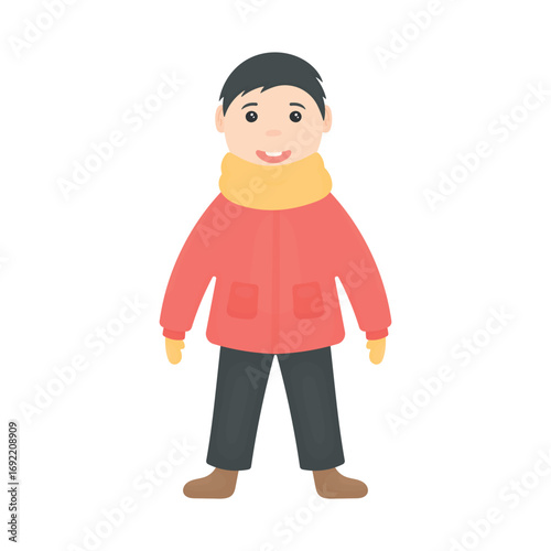 Boy warmly dressed stands smiling. Child in winter season