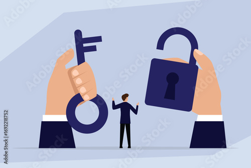 Finding the solution. A businessman stands between two giant hands, one holding a key and the other an open padlock
