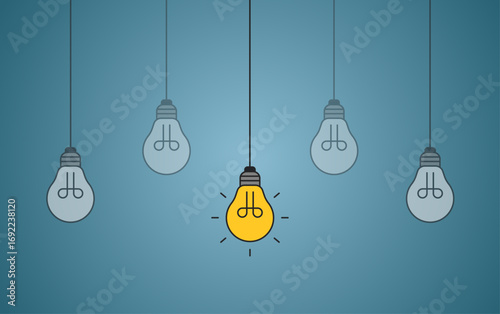 Hanging light bulbs with one glowing on blue background. Concept of idea