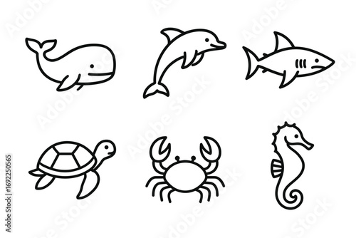 Set of cartoon sea animal illustrations: whale, dolphin, shark, turtle, crab, seahorse