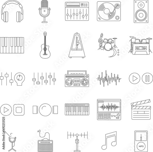 Collection of musical equipment and symbols arranged neatly on a surface, offering an organized exploration of the art of creating music.