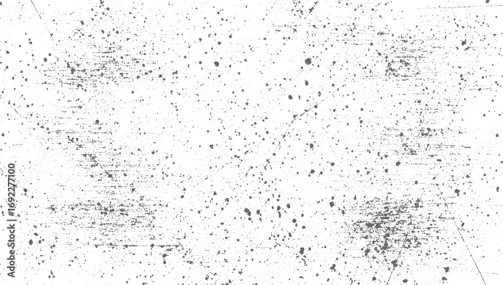 Obraz premium A distressed gray and white textured background with scattered speckles and scratches.