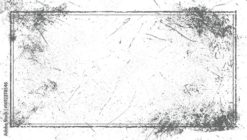 A distressed rectangular frame with speckles and scratches creating a grunge texture.