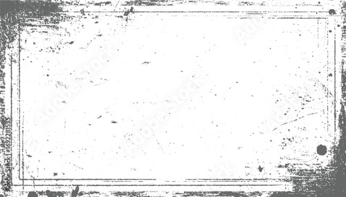 A gray textured background with numerous scratches and speckles creating a distressed grunge effect.