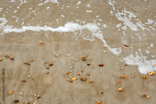 Un vague sur le sable