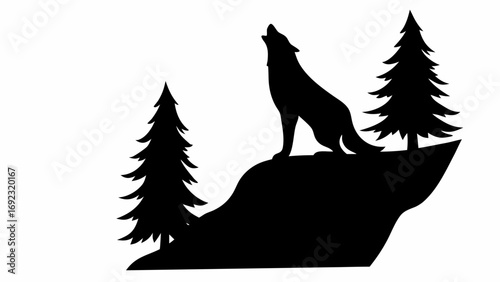 Silhouette of howling wolf on hill between two pine trees creating a stark and natural landscape scene