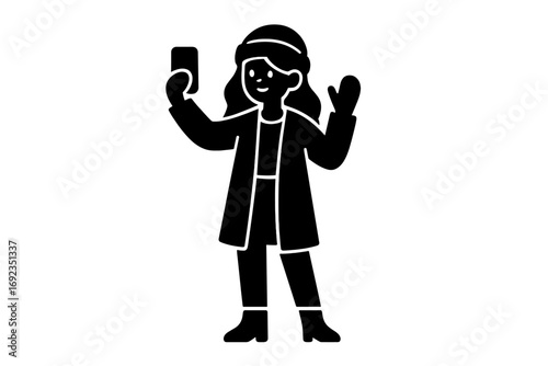 Young woman in winter clothing including a hat, coat, and mittens taking a selfie with a smartphone, black glyph icon on a white background