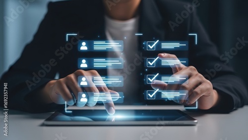 Man using tablet glowing with digital checklist and human icons, focused on applicant tracking and resume automation workflow