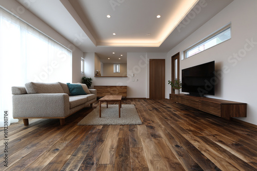 Modern living room interior with wooden floor.