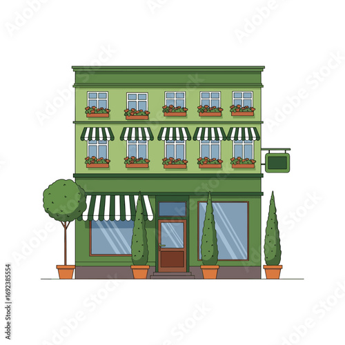 Charming green building with outdoor seating and lush landscaping perfect for a cafe or boutique store