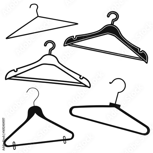 Collection of five different black and white clothing hangers isolated on a white background showcasing various designs for organizing garments