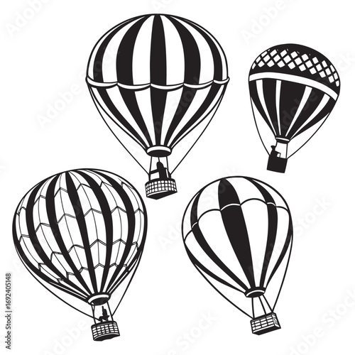 A collection of four black and white hot air balloons with distinct patterns and baskets floating against a white background suggesting travel and adventure