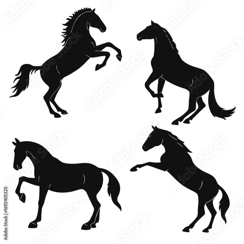 Collection of four black horse silhouettes in dynamic poses including rearing and standing isolated on a white background representing power and freedom