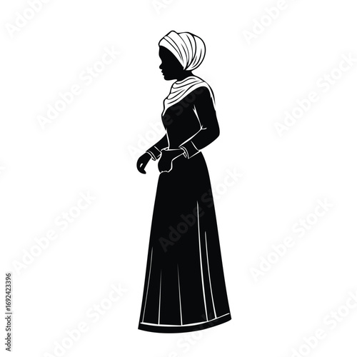 Silhouette of a woman wearing a headscarf and long dress, standing in profile.