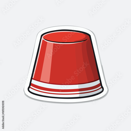 A red plastic cup with white stripes, commonly used for beverages and parties.