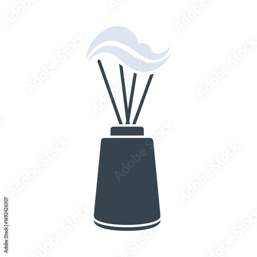 Reed diffuser with scented oil and wisps of fragrance.