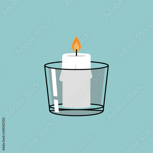 A lit white candle floats in a glass of water.