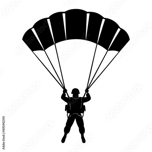 Silhouette of a soldier parachuting from the sky