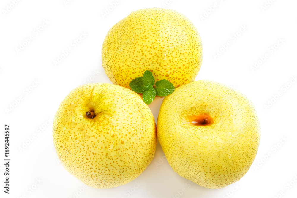 Fototapeta premium Fresh Golden Dangshan Pears with Mint on White Background - Healthy Fruit Photography