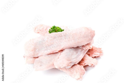 Cuadro en lienzo Fresh Raw Duck Wings with Parsley Garnish on White Background for Gourmet Cookin