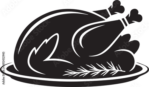 Black silhouette of a roasted turkey on a platter with garnish