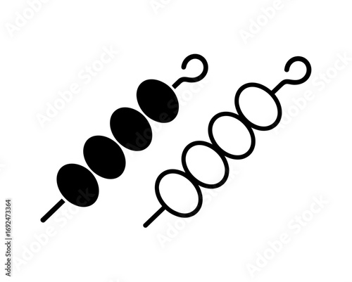 Illustration of two skewers with circular food items in black and white on a plain white background silhouette
