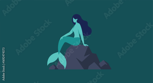 Teal mermaid sits