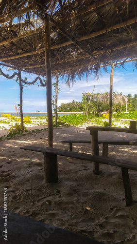 A rustic cabin by Castelhanos Beach offers the perfect spot to relax on Boipeba Island, Bahia, Brazil.