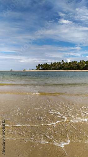 Endless shades of blue paint the horizon at Castelhanos Beach, a natural paradise on Boipeba Island, Bahia.