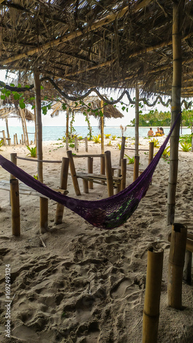 A rustic cabin by Castelhanos Beach offers the perfect spot to relax on Boipeba Island, Bahia, Brazil.