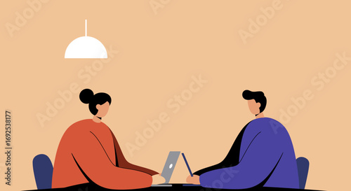 Two professionals collaborating on laptops in a modern office or coworking space, representing teamwork, productivity, and digital communication.
