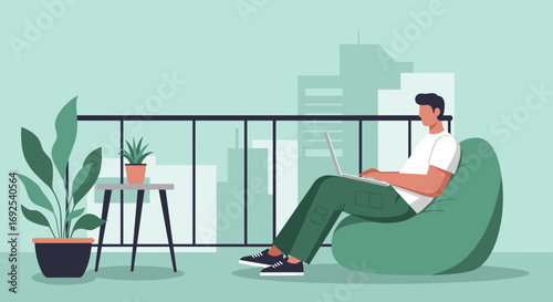 Man working on laptop from a comfortable bean bag chair on a balcony with city views. Represents remote work, freelance lifestyle, and urban living.