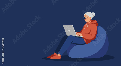 Elderly woman comfortably using a laptop on a bean bag chair, symbolizing modern seniors embracing technology and remote leisure.