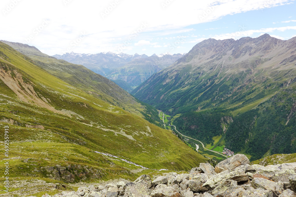 Fototapeta premium The view opening from the high hiking way from Tiefenbach glacier to Vent in Oetztal valley in the Austrian Alps 