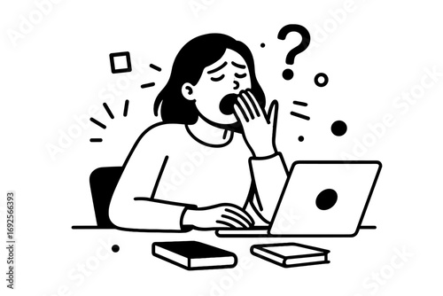 Overworked woman at her desk with a laptop yawning from fatigue and burnout due to remote work or intense studying
