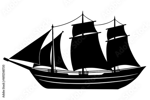 Silhouette of a vintage sailing ship with full sails
