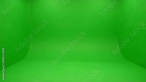 Empty Green Screen Studio Background with Seamless Curved Wall and Floor for Chroma Key Compositing