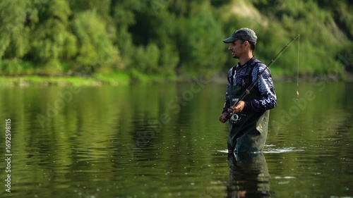 A fisherman casts a spinning lure while fishing
