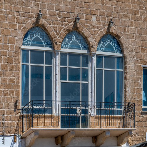 Interesting windows in Acre, Akko, Israel on a sunny day.
