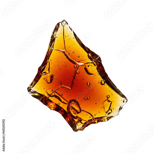 Sharp Shard of Crème Brûlée Caramel Isolated on White Background

