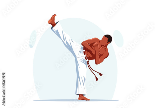 Man performs a high kick in martial arts training.
