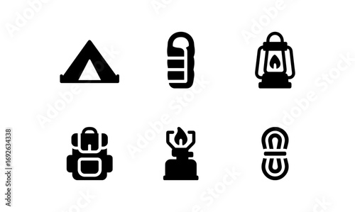 Minimalist camping icons: tent, lantern, and backpack essentials for outdoor adventures